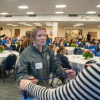 photo of student receiving honor cord